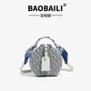 Bolsas de Mujer Transfronterizas 2026 Nueva Bolso Redondo Casual Bolso de Hombro Único Cruzado Monograma Bolso Redondo Pequeño en Forma de D Dropshipping