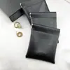 Bolsa de Cierre Automático con Resorte de Cuero Aceitado Importada de Fábrica para Labiales, Gafas, Auriculares, Cable de Datos, Joyería Estampada con Logo