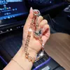 Llavero de coche con cadena de cristal facetado de mariposa de cristal muy elegante y único, correa de teléfono de moda y personalizada, accesorio para bolso