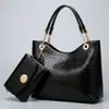26 anos Conjunto de duas peças coreano europeu elegante padrão de crocodilo bolsa feminina de um ombro essencial para sair bolsa tote feminina