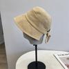 Sombrero de pescador con correa de reloj y apertura trasera de estilo japonés para mujer, estilo artístico, informal, de color sólido, estilo Hong Kong, resistente al sol.