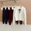 Cardigã de tricô com gola Peter Pan e laço estilo college para mulheres, jaqueta suéter versátil estilo coreano para outono/inverno, top curto