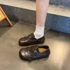 Nuevos mocasines casuales retro de estilo británico de moda, versátiles para cualquier atuendo, zapatos slip-on para mujer, colección otoño 2026, con detalle de hebilla