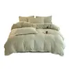Juego de ropa de cama de cuatro piezas de terciopelo de leche tallado, edredón y juego de sábanas de forro polar coral engrosado y cálido para invierno