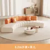 Salón de belleza área de recepción estilo color crema sofá semicircular bicolor piso plano grande tienda de ropa oficina de ventas descanso recepción