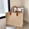 2026 Novo Modelo Ano do Coelho Bolsa de Feltro Presente de Ano Novo Lembrança Bolsa Tote de Feltro Personalizada Vários Presentes de Feltro