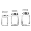 Botella cuadrada de vidrio engrosada medio jin 1 jin 2 jin botella de miel botella de nido de pájaro Nueva Alta botella cuadrada transparente fondo grueso sellada