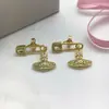 Novos Brincos Saturno Transfronteiriços da Rainha Mãe para Mulheres, Agulhas de Prata 925, Luxo de Alto Padrão, Brincos Planeta Vivienne Minimalistas