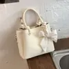 Bolso de mano casual de moda transfronterizo para mujer, moderno bolso tipo cubo nuevo de verano 2026, bolso de hombro y cruzado