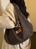 Bolsa de tela de gran capacidad para mujer otoño e invierno 2026 nueva bolsa de lona versátil bandolera estilo perezoso bolsa de mano para ir al trabajo