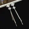 Pendientes de Copo de Nieve de Circonita Super Brillantes, Elegantes, de Moda y Exquisitos, Pendientes Largos con Borlas, Lujo Ligero, Versátiles y de Gama Alta