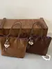 Bolso de mano grande de estilo coreano, minimalista y elegante, bolso cruzado con acabado mate, bolso de cadena minimalista de nicho, bolso de hombro tipo cubo para mujer