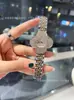 Soporte de Envío Directo Trébol de Cuatro Hojas Completo de Diamantes Nicho Lujo Ligero Tendencia de Moda Correa de Acero Reloj de Cuarzo para Mujer Reloj Deichka