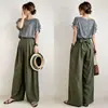 Conjunto nuevo de verano 2026 estilo japonés: camisa de cuello redondo de doble capa con volantes y hombros descubiertos y pantalones de pierna ancha con corbata