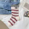 Nuevos calcetines europeos de doble puño de alto valor, calcetines finos de felpa, calcetines a rayas para mujer, serie miu, primavera y verano, calcetines de algodón de tubo medio