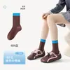 Calcetines estilo Melard para mujer, calcetines sin costuras hasta la pantorrilla, versátiles calcetines de algodón para otoño e invierno con rayas verticales, rayas texturizadas y diseño de volantes en bloques de color