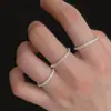 Anillo de cadena blanda brillante transfronterizo europeo y americano para mujer, anillo de metal versátil de moda de alta gama, anillo liso apilable para mujer