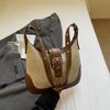 Bolsa de grande capacidade feminina primavera e verão 2025, novo design de nicho, bolsa de ombro transversal da moda, bolsa de bolinho de massa feminina estilo coreano