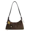 Bolsa de ombro de alta qualidade e estilosa para mulheres, nova coleção outono/inverno 2025, versátil para o trabalho e o trajeto, bolsa crossbody com design semelhante a um bolinho