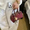 Bolso tipo almohada retro de axila de mano para mujer, nuevo modelo 2026, versátil bolso casual de gamuza para hombro y cruzado