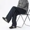 Calça casual de perna reta texturizada para homens, novo estilo verão 2026, calça de moletom solta e com caimento, calça esportiva moderna e versátil