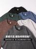 Camiseta de manga corta de algodón peinado batik de 260 g con hombros descubiertos y cuello redondo para hombre, estilo europeo, holgada, lavada y de media manga.
