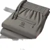 Pantalones casuales de pierna recta holgados con forro polar para hombre, de alta gama, transfronterizos, para otoño e invierno, con cintura elástica