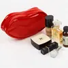 Fábrica de Guangzhou Bolsa Cosmética Personalizada con Forma de Labio Rojo para Viajes Diarios, Bolsa Universal Impermeable para Lipstick con Marca de Logo