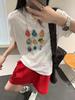 Camiseta Feminina de Manga Curta com Estampa de Frutas em Blocos de Cor para Mulheres Estação Europeia 2025 Estilo Verão Tops Casuais Estilo Europeu Feminino