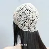 Gorro de ganchillo hecho a mano estilo étnico vintage holgado para mujer Primavera Verano Artístico Versátil Hueco de punto