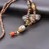 Cadena de suéter estilo étnico vintage collar largo para hombres y mujeres versátil madera de ala de pollo adornos de ropa de algodón y lino exquisitos decoración