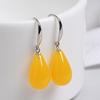 Pendientes de plata s925 para mujer, pendientes de cera de abeja con incrustaciones de ámbar, pendientes de ámbar amarillo sangre de aceite de pollo, gancho de oreja, pendientes de temperamento, pendiente de oreja