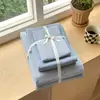 Juego de ropa de cama de cuatro piezas de algodón 100%, tejido de color, algodón lavado, estilo japonés transfronterizo, con un diseño minimalista de cuadros y rayas, incluyendo una funda nórdica y una sábana bajera de algodón puro