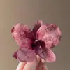 2025 Flor de Simulación de Principios de Primavera Pasador para el Cabello Estilo Puro Deseo Pasador de Orquídea Marina Estilo Festivo Clip Lateral para Fotografía Accesorios para el Cabello de Ambiente