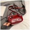 Bolso Pequeño Versátil Transfronterizo para Mujer 2026 Nueva Moda Bolso Tipo Bowling Texturizado Bolso Cruzado Simple de Gama Alta
