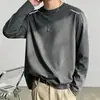 Camiseta casual versátil de manga comprida para outono para homens, gola redonda, cor sólida da moda, confortável, respirável e com caimento solto