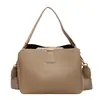 Otoño 2026 Nuevo Bolso Cubo de Mano de Color Sólido a la Moda Bolso Cruzado de Hombro Único de Gran Capacidad de Color Sólido para Mujer
