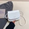 Bolso Minimalista de Nicho tipo Silla de Montar para Mujer 2026 Nuevo Estilo Coreano de Moda Bolso Cruzado Versátil Bolso Pequeño Cuadrado de Nicho para Viajes