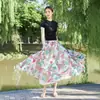 26 Nova Saia Estampada Estilo Boho Resort Europeu e Americano Primavera/Verão com Barra Larga para Mulheres