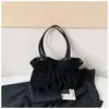 Bolsa de ombro retrô elegante e de alta qualidade, nova para 2026, de grande capacidade para o dia a dia, com um design de bolsa tote descontraído, plissado e de cor sólida