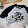 Nueva Camiseta de Manga Larga para Niños de Primavera y Otoño, Ropa Interior, Niños Elegantes, Niños Medianos y Pequeños, Estampado Retro, Ropa de Abrigo, Niñas Modernas