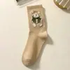 Meias de urso meias femininas de comprimento médio outono e inverno ins moderno fofo que combinam com tudo fresco estilo japonês marrom meias de uso externo outono e inverno
