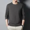 Camiseta de manga larga con cuello redondo para hombre de otoño e invierno, camiseta básica de color liso, top holgado casual, venta al por mayor transfronteriza