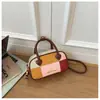 Bolsa Boston de Pelúcia Color Block Outono/Inverno para Axila 2026 Nova Grande Capacidade para o Dia a Dia Bolsa de Ombro Único Casual Versátil Feminina