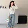 Camiseta Falsa de Duas Peças com Manga Longa para Meninas Primavera Outono 2026 Novo Estilo Meninas Grandes Alunos do Ensino Fundamental Estilosa Estilo Coreano Camada Base Top