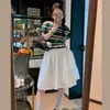 Nova Saia Casual de Cintura Alta Estilo Coreano Linha A para Mulheres Primavera/Verão 2026 Plissada Versátil Branca Saia de Cinco Pontos