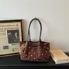 Bolso de Axila Estilo Ballet de Diseño de Nicho para Mujer 2026 Versátil Nuevo Retro Gamuza Felpa Estilo Coreano para Viaje Diario Bolso de Hombro Único