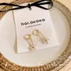Pendientes de Nuevo Estilo 2026 para Mujer, Estilo Celebridad de Internet, Pequeños y Delicados Clips para Oreja de Flor con Cadena de Cristal, Pendientes de Diseño Único