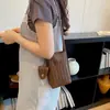 Bolso de teléfono de patrón tejido de moda transfronterizo, nuevo bolso pequeño simple de moda de verano 2026, bolso de hombro cruzado de alto valor estético