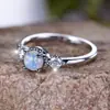 Moda transfronteriza AliExpress para ir al trabajo Palladium Blanco K redondo ópalo blanco anillo simple suministro de fábrica una pieza venta al por mayor
